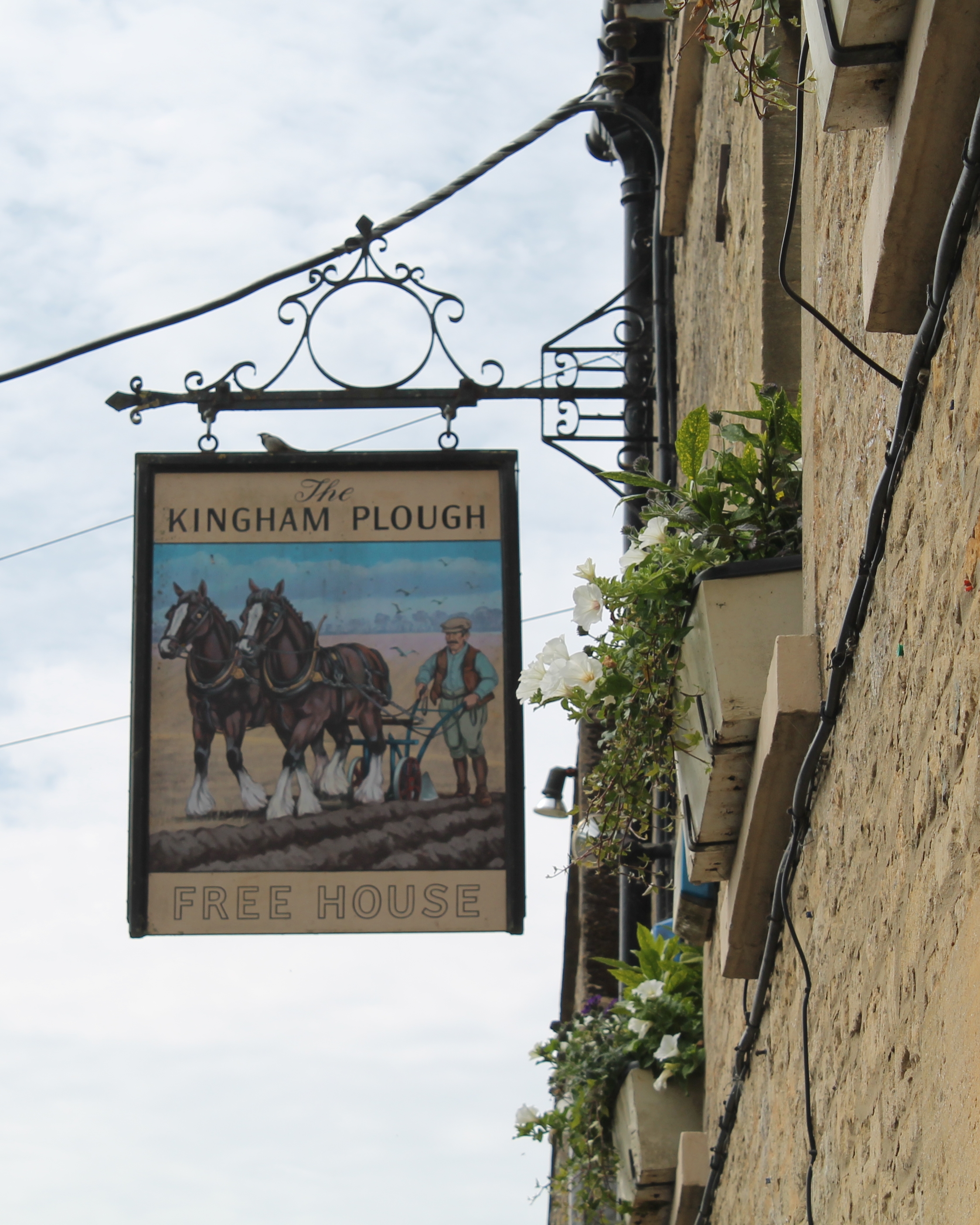 The sign of the Kingham Plough