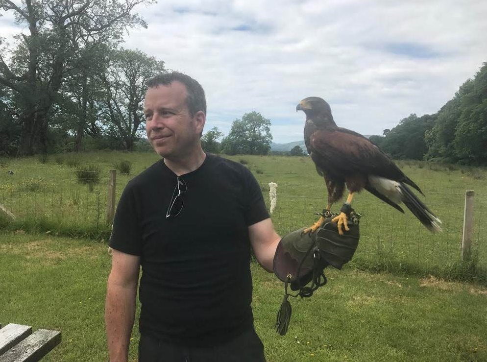 Duncan holding a big bird